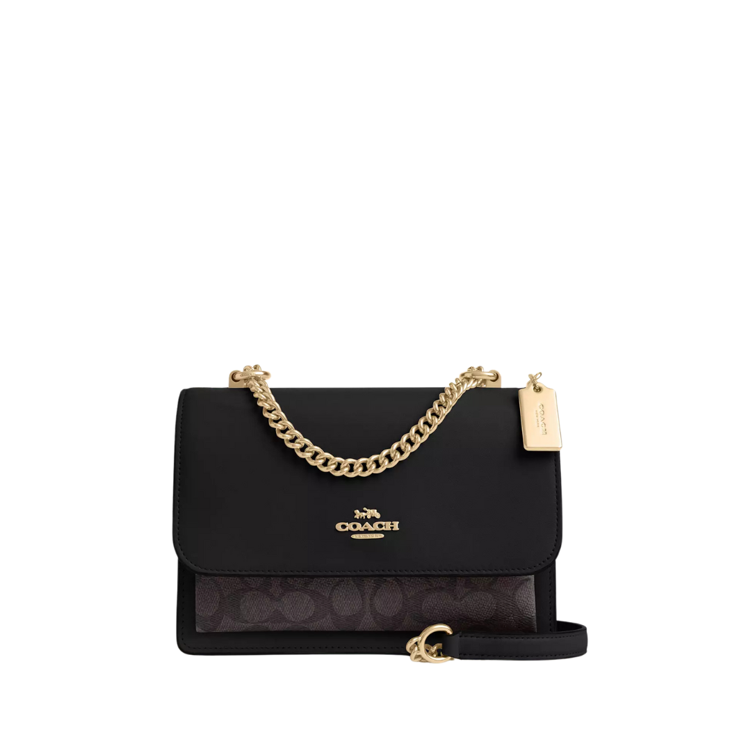 حقيبة كروسبودي من كوتش كلير، لون أسود/بني داكن، مصنوعة من قماش الكانفاس المميز وحواف جلدية (طراز CV978)